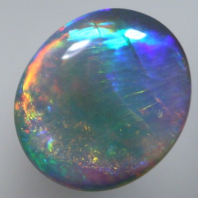 SOLID SEMI BLACK OPAL Blend of orange and green, red and blue